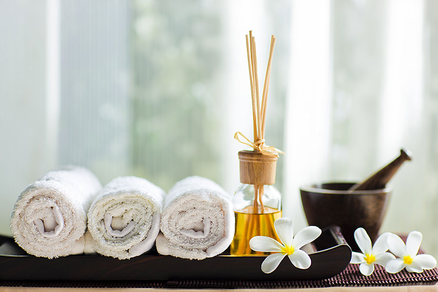 massage towels, oils on a table at Elysium best spa center in G9 Islamabad